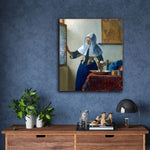 Young Woman with a Water Pitcher by Johannes Vermeer