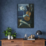 The Old Guitarist by Pablo Picasso