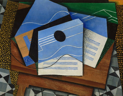 Guitar on a table by Juan Gris